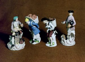 Míšeňské figurky: sedlář, prodavač koz a měditepec, model Johann Joachim Kandler (1706-75) a pekař Peter Reinicke (1715-68), kolem 1750 (porcelán)